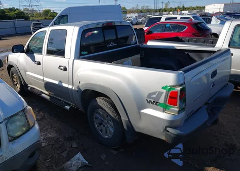 2006 Mitsubishi Raider Duro Cross V6 z USA, uszkodzony, nr VIN 1Z7HT38KX6S580120